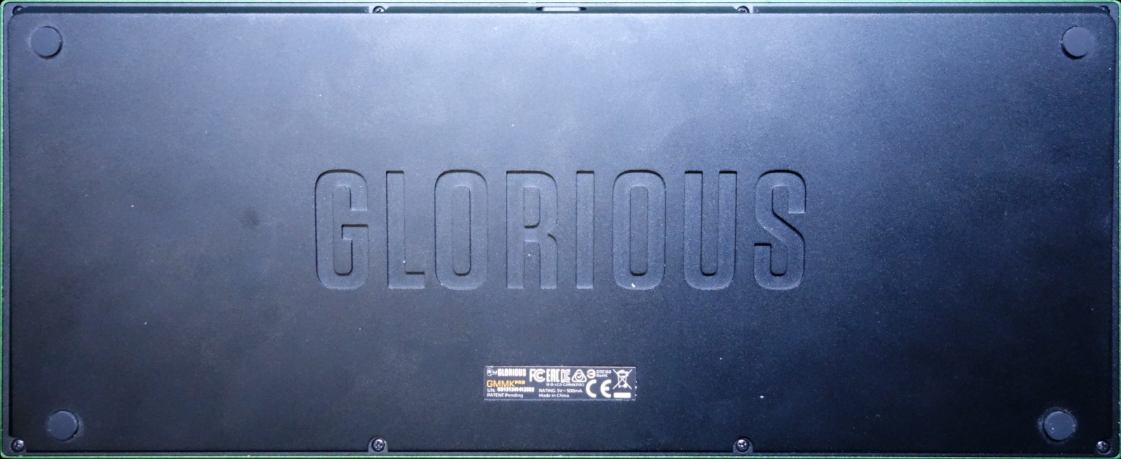 Bottom view (black, engraved with GLORIOUS wordmark)